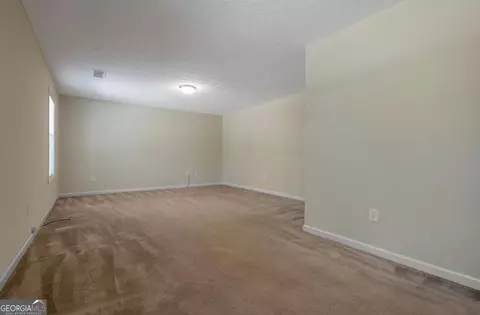 Living - 328 Yorkshire Trce, Hampton, GA 30228 photo 3 of 3