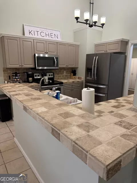 Kitchen - 115 Saint Marlo Dr, Centerville, GA 31028 photo 3 of 4