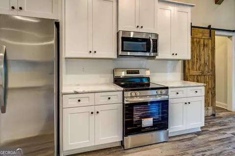 Kitchen - 282 Perkins Rd, Barnesville, GA 30204 photo 5 of 5