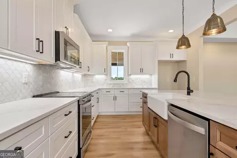 Kitchen - 4711 H D Atha Rd, Covington, GA 30014 photo 2 of 3