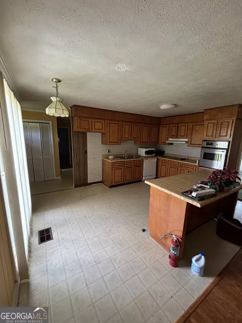 Kitchen - 378 Arena Rd, Perry, GA 31069 photo 1 of 2