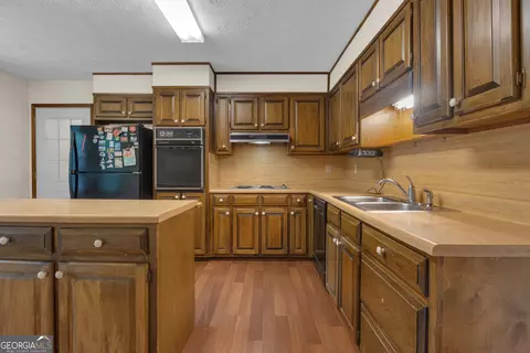 Kitchen - 886 Pine Needle Rd, Hampton, GA 30228 photo 2 of 5