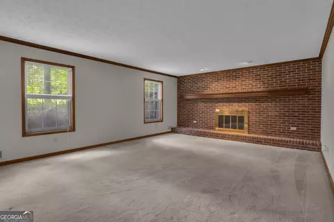 Living - 886 Pine Needle Rd, Hampton, GA 30228 photo 2 of 3