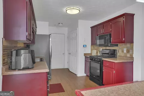 Kitchen - 11367 Vinea Ln, Hampton, GA 30228 photo 2 of 3