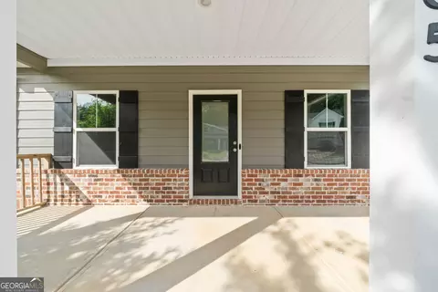 Exterior - 385 Orchard Ln, Covington, GA 30014 photo 2 of 8
