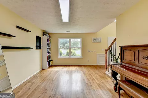 Living - 3668 Burel Mill Dr, Buford, GA 30519 photo 2 of 8