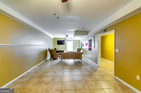 Living - 1373 Fall River Dr, Conyers, GA 30013 photo 4 of 5