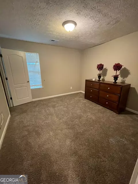 Bedroom - 75 Trelawney Keep, Covington, GA 30016 photo 1 of 4