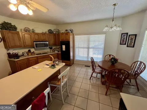 Kitchen - 363 Cedar Rd, Uvalda, GA 30412 photo 4 of 5
