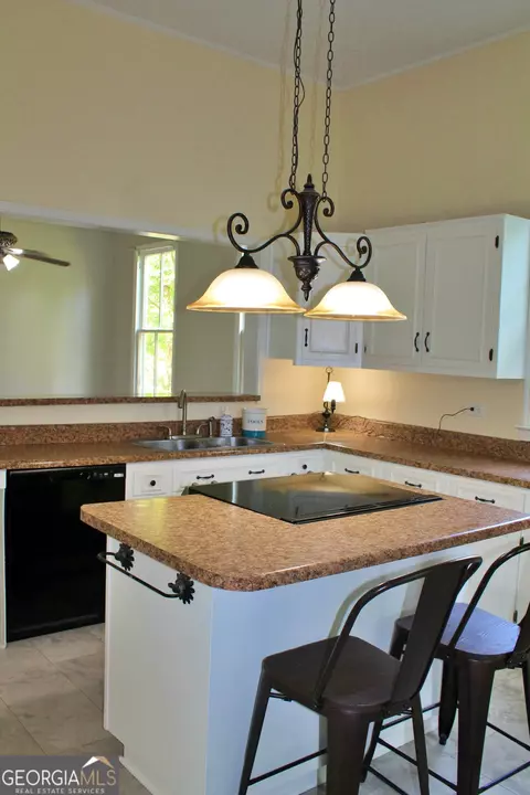 Kitchen - 120 Holmes St, Barnesville, GA 30204 photo 2 of 2