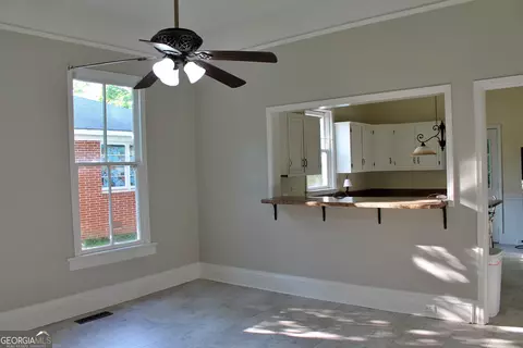 Living - 120 Holmes St, Barnesville, GA 30204 photo 1 of 1