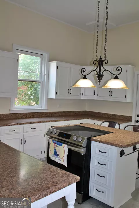 Kitchen - 120 Holmes St, Barnesville, GA 30204 photo 1 of 2