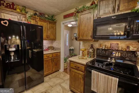 Kitchen - 55 Ashton Pl, Covington, GA 30016 photo 6 of 7