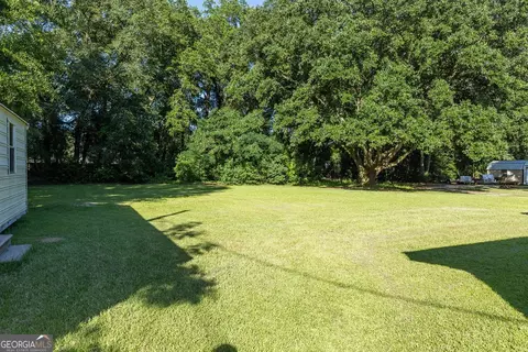 Exterior - 84 Poplar St, Guyton, GA 31312 photo 6 of 11