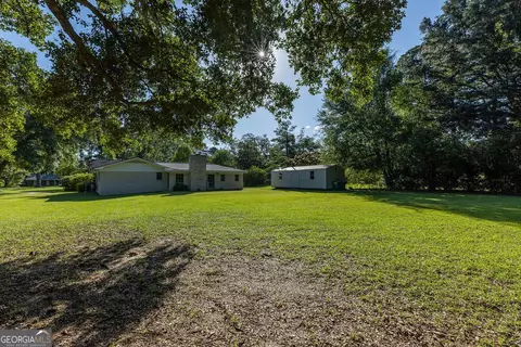 Exterior - 84 Poplar St, Guyton, GA 31312 photo 9 of 11