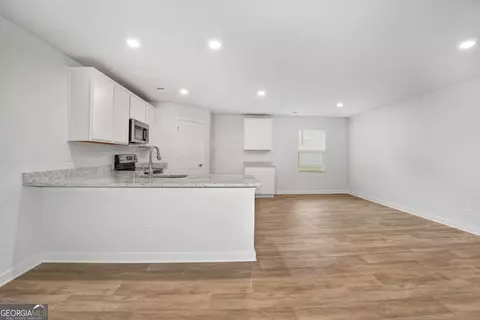 Living - 1184 Bluecoat Cir #84, Hampton, GA 30228 photo 1 of 3