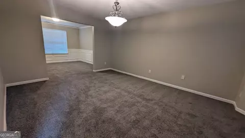 Living - 705 Mustang Ct, Hampton, GA 30228 photo 1 of 6