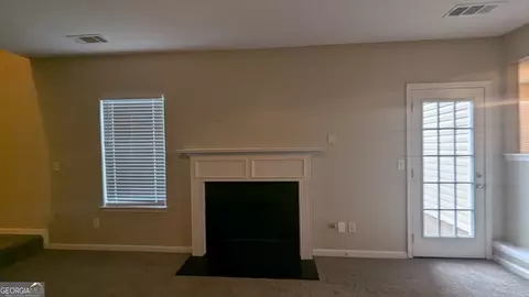 Living - 705 Mustang Ct, Hampton, GA 30228 photo 5 of 6