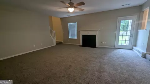 Living - 705 Mustang Ct, Hampton, GA 30228 photo 6 of 6