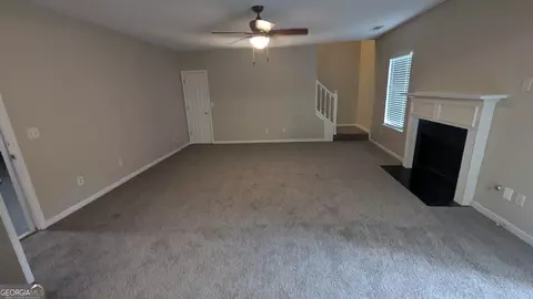 Living - 705 Mustang Ct, Hampton, GA 30228 photo 3 of 6