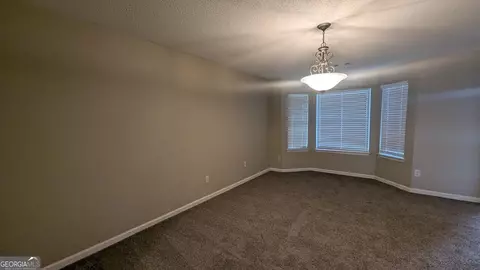Living - 705 Mustang Ct, Hampton, GA 30228 photo 2 of 6