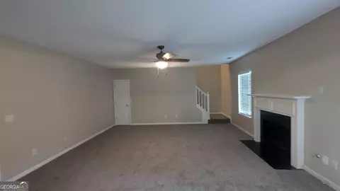 Living - 705 Mustang Ct, Hampton, GA 30228 photo 4 of 6