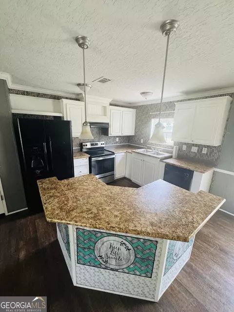 Kitchen - 563 Sawmill Rd, Collins, GA 30421 photo 1 of 1