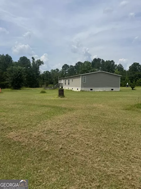 Exterior - 563 Sawmill Rd, Collins, GA 30421 photo 2 of 2