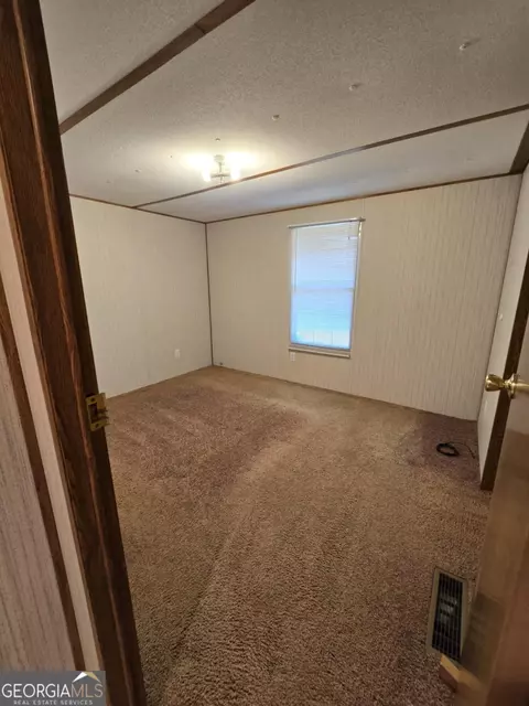 Bedroom - 85 North Ave, Hampton, GA 30228 photo 3 of 3