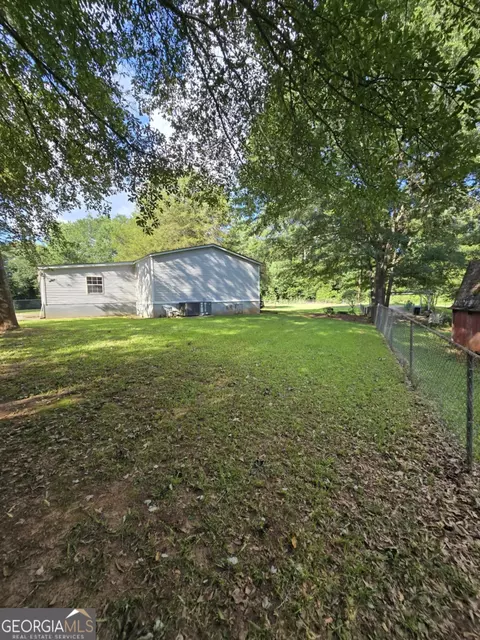 Exterior - 85 North Ave, Hampton, GA 30228 photo 7 of 13