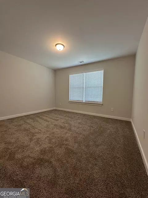 Bedroom - 11209 Cornerstone Way, Hampton, GA 30228 photo 7 of 9