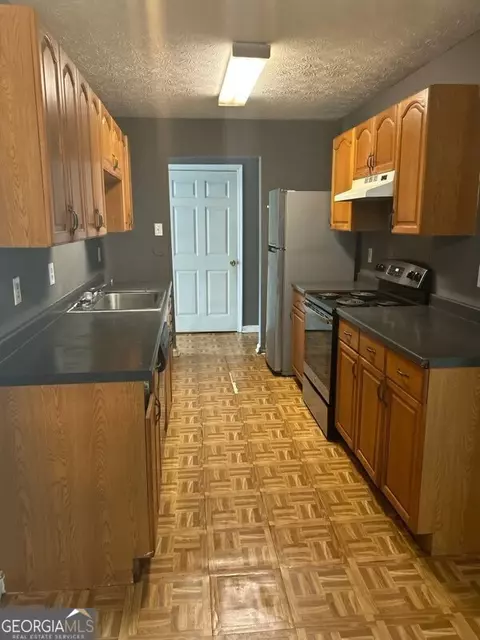 6968 Fielder Rd, Rex, GA 30273 photo 2