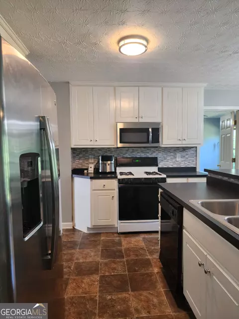 Kitchen - 309 Lynn Dr, Covington, GA 30016 photo 1 of 2