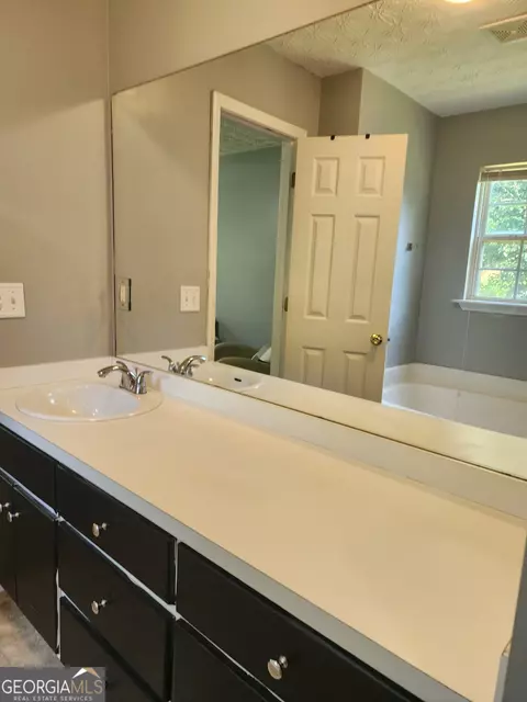Bath - 309 Lynn Dr, Covington, GA 30016 photo 2 of 3