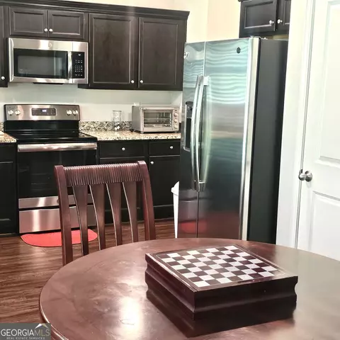 Kitchen - 97 Citadel Dr, Hampton, GA 30228 photo 2 of 4