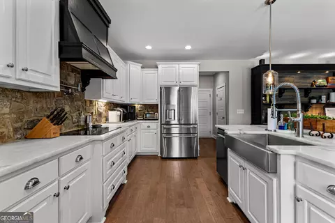 Kitchen - 106 Huckaby Rd, Brooks, GA 30205 photo 7 of 10