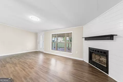 Living - 166 James Dr, Hampton, GA 30228 photo 2 of 6