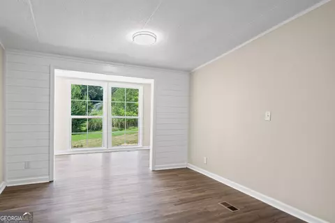 Living - 166 James Dr, Hampton, GA 30228 photo 4 of 6