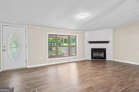 Living - 166 James Dr, Hampton, GA 30228 photo 1 of 6