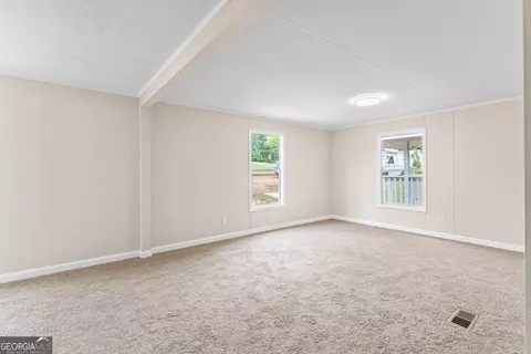 Living - 166 James Dr, Hampton, GA 30228 photo 5 of 6