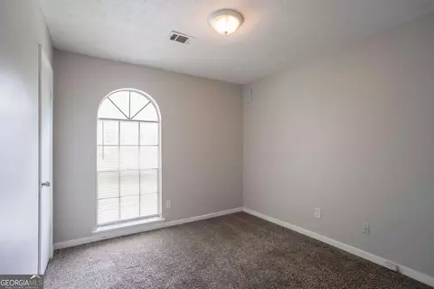 Bedroom - 5404 Biffle Downs Rd, Stone Mountain, GA 30088 photo 4 of 8