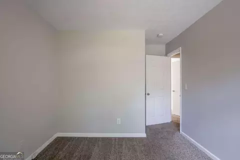 Bedroom - 5404 Biffle Downs Rd, Stone Mountain, GA 30088 photo 6 of 8