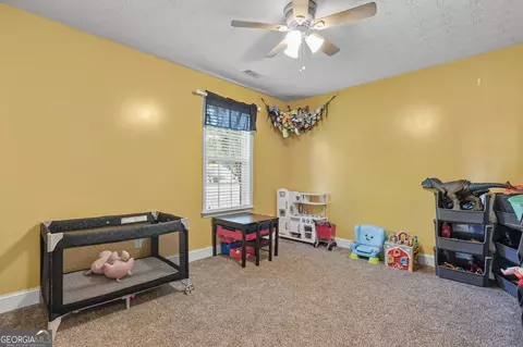 Bedroom - 101 Crestwood Ct, Hampton, GA 30228 photo 5 of 6