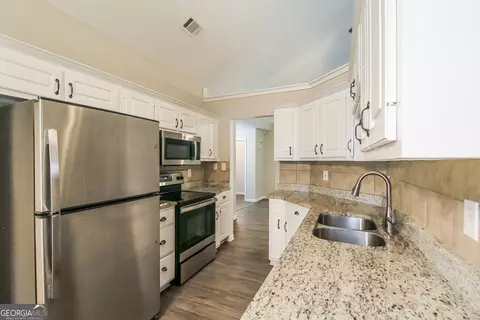 Kitchen - 235 Mountain Way, Covington, GA 30016 photo 2 of 2