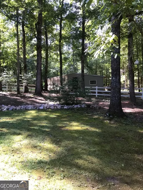 Exterior - 2088 Gresham Rd, Zebulon, GA 30295 photo 7 of 27