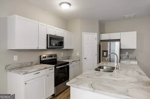 Kitchen - 103 Three Rivers Ct, Hull, GA 30646 photo 3 of 4