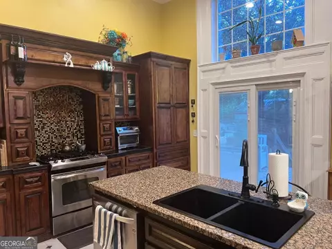 Kitchen - 201 Eighth St, Adel, GA 31620 photo 4 of 6