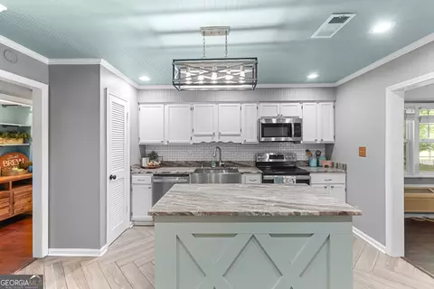 Kitchen - 316 Arena Rd, Perry, GA 31069 photo 7 of 9