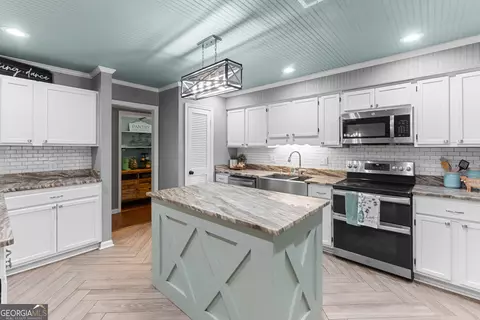 Kitchen - 316 Arena Rd, Perry, GA 31069 photo 2 of 9