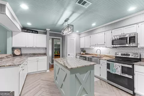 Kitchen - 316 Arena Rd, Perry, GA 31069 photo 5 of 9